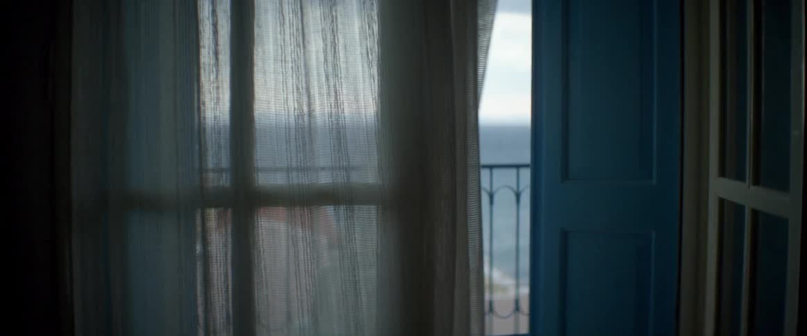 Curtains blowing in the breeze