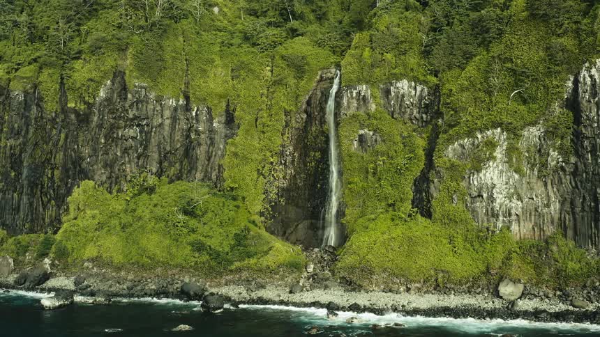 A waterfall by a coast