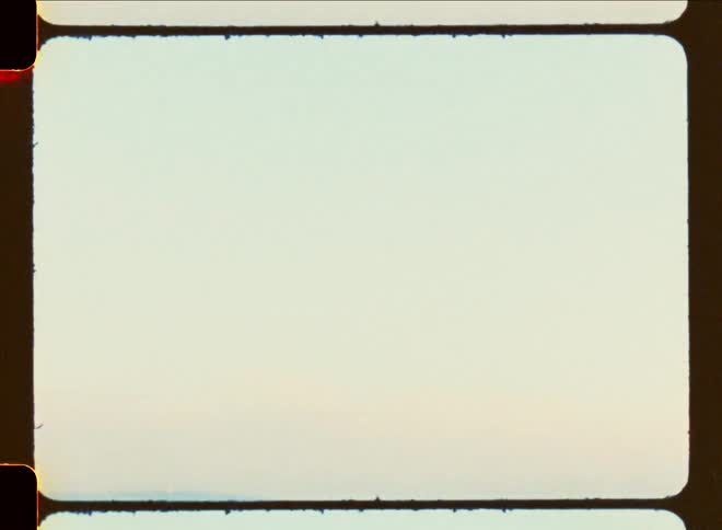 An airplane flying in the sky over a beach with a large strip of sand and some people walking