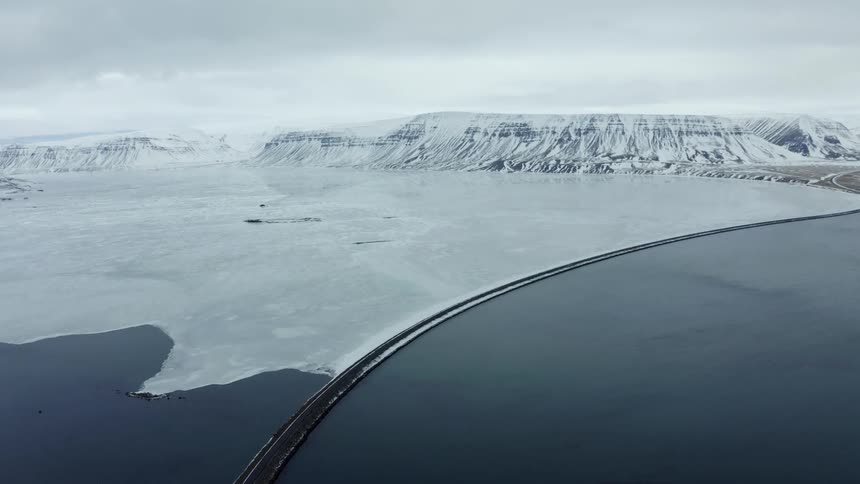 A road on the edge of a glacier