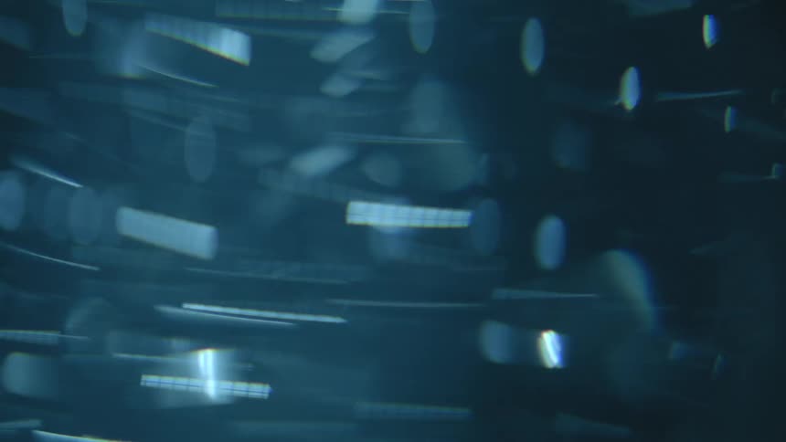 Extreme close up of water with swirling bubbles