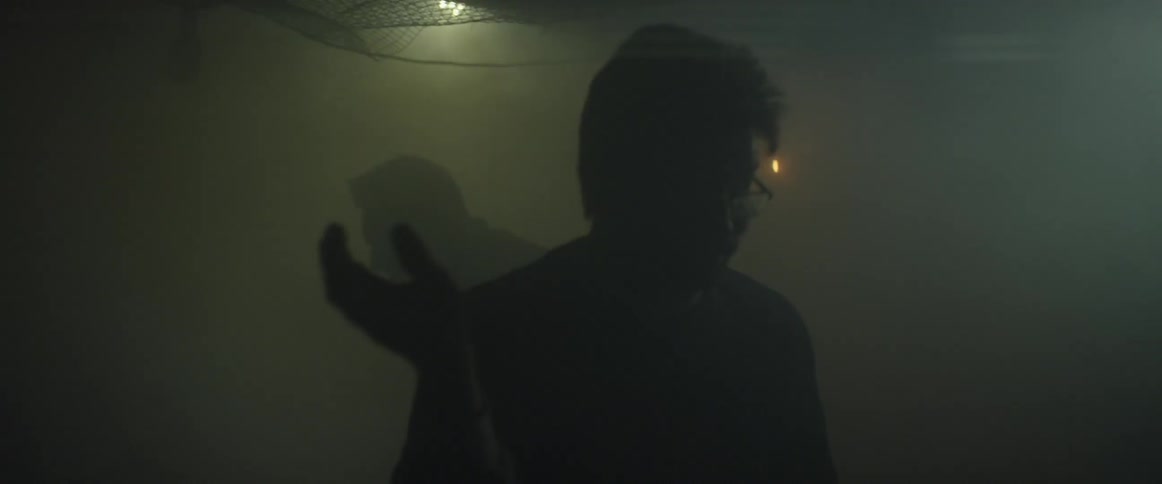 Smoke from fireworks engulfs a group of people