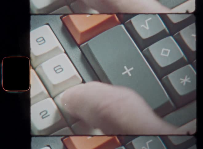 S8 close up of a persons hand typing on a keyboard of a calculator pressing the plus or + key adding new amounts or sums to the balance or bookkeeping or cash check of his business store or household or doing math homework for his studies