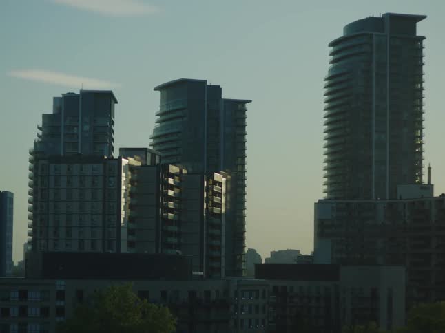Tall buildings fill the sky