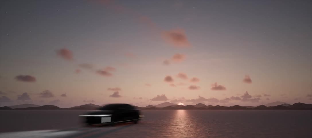 A luxury car driving across desert crosses through sunlight shining onto sand under a sunset sky