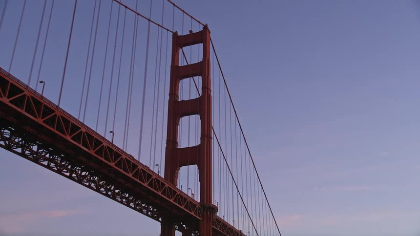 The golden gate bridge spans a bay