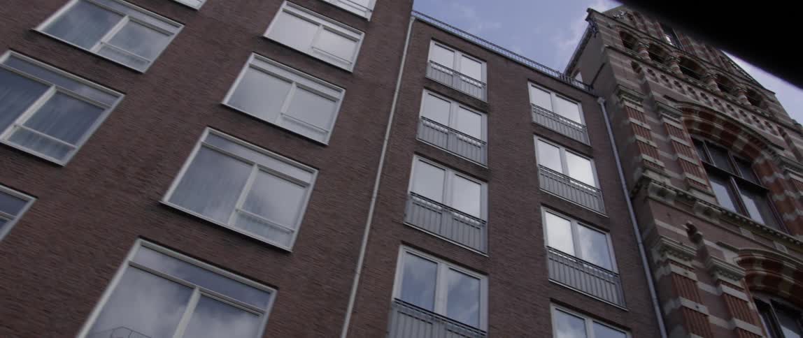 The stone building has many windows