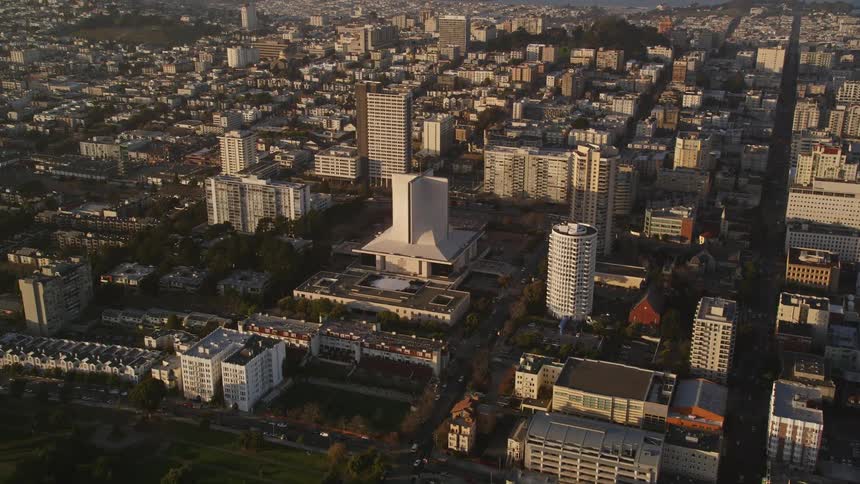 View from above of a metropolis with skyscrapers and the seafront