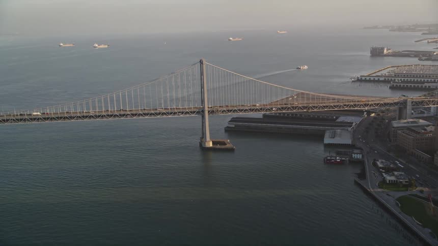 Aerial view of a bridge near the city at morning