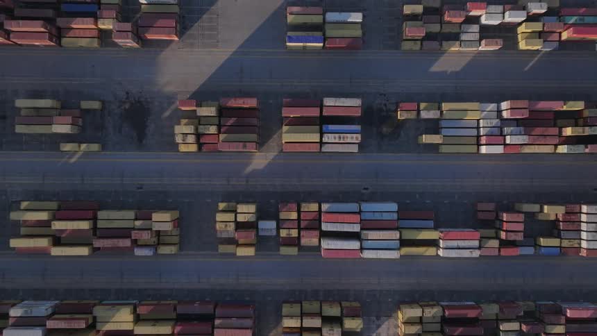 Stacks of shipping containers at a port facility