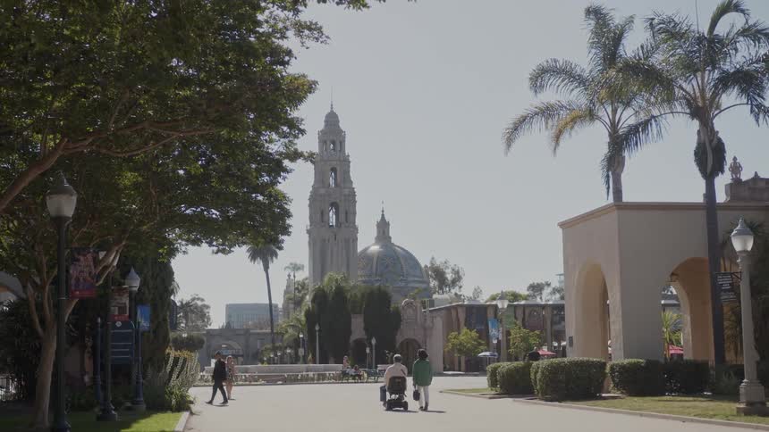People walk in the town square