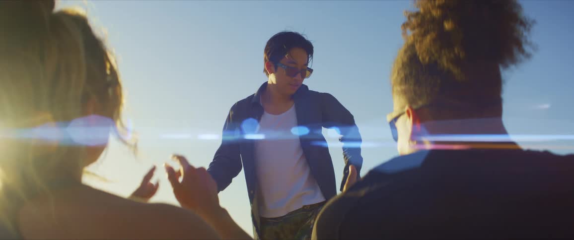 A teenager dances for friends
