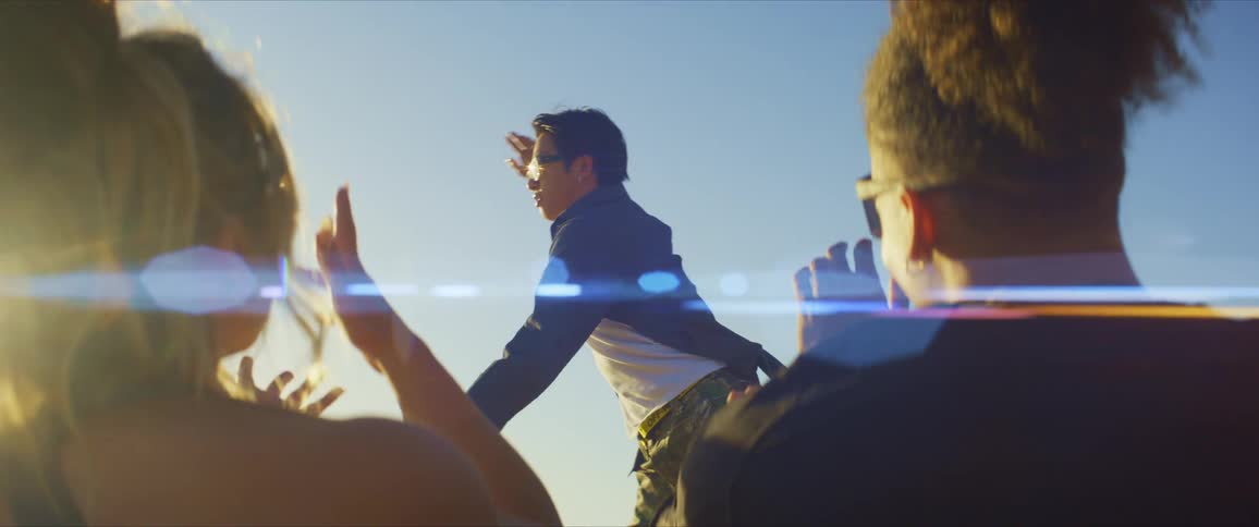 Friends watch as he dances