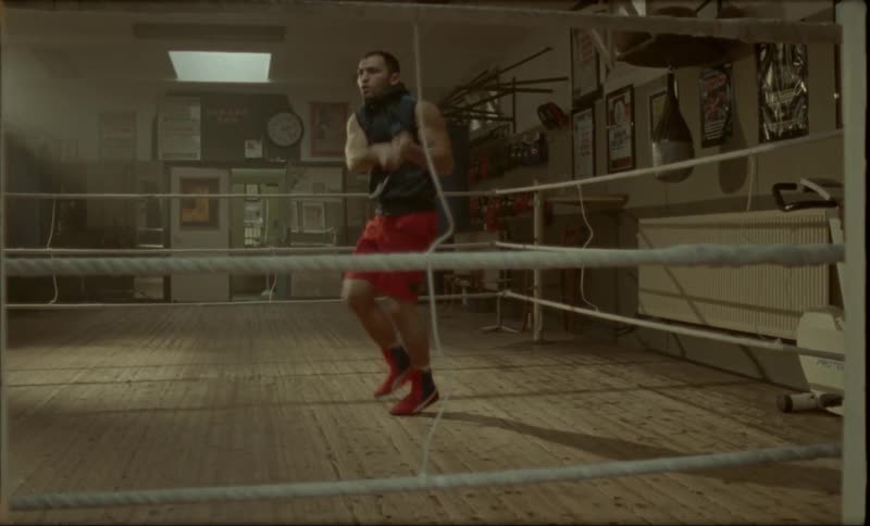 Man inside a ring jumping rope