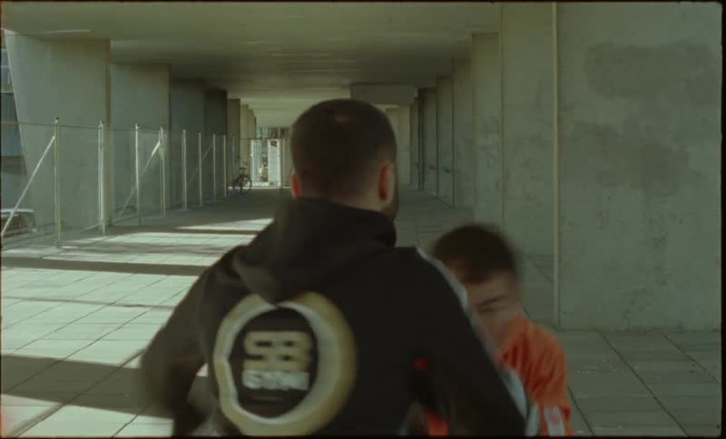 Boxer training with a partner in a tunnel