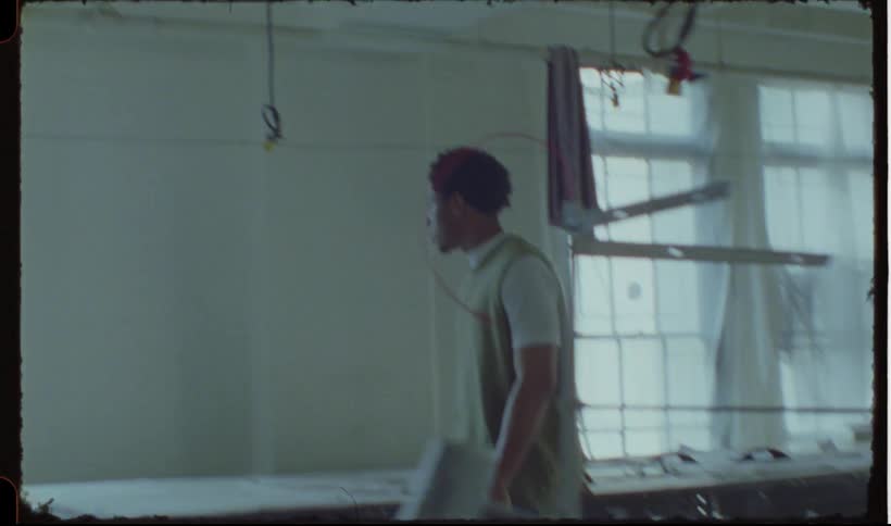 Man walking inside a factory