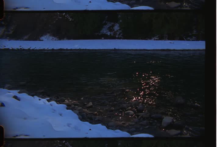 Lake with snowcovered shores