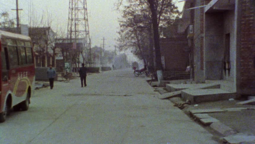 People are walking through town