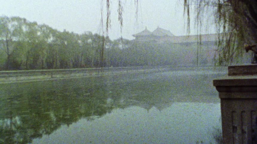 The moat surrounding Beijing's Forbidden City is covered in mist
