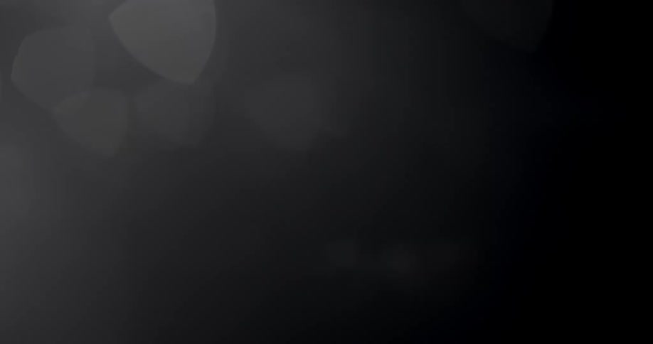 Soft glowing diffused reflections against a dark background