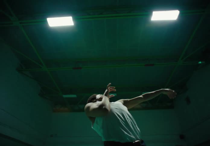 Man indoors dancing