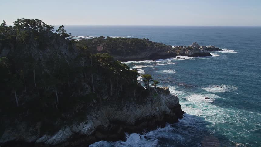 The island is surrounded by blue waters
