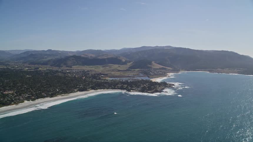 Aerial panorama of a peninsula with a city by the sea