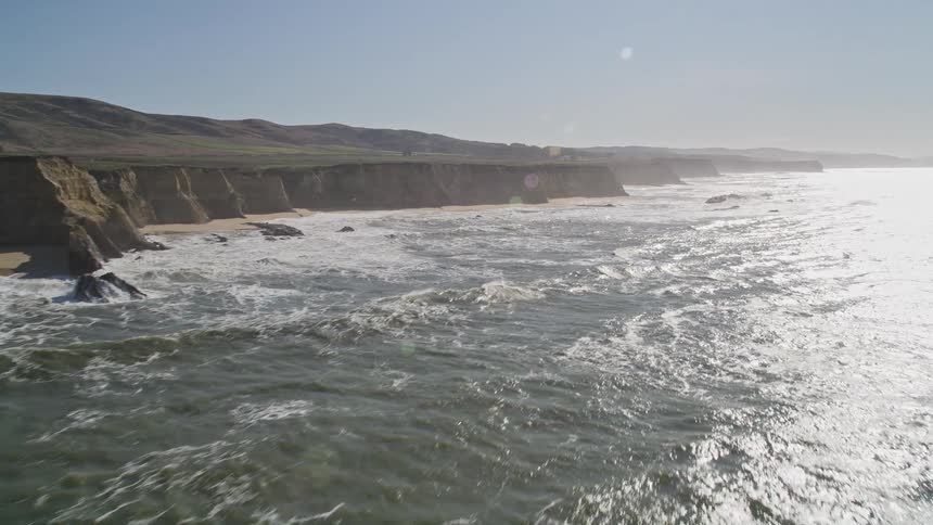 Aerial scenery of an extensive sea that bathes the rocky coast