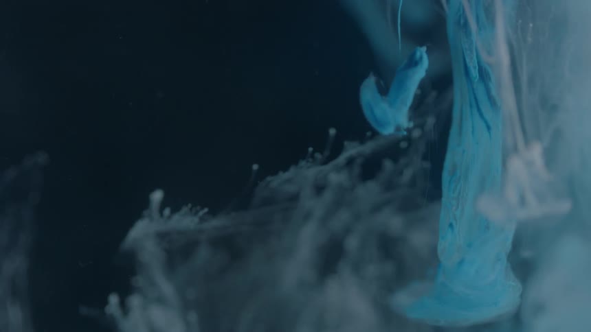 White clouds move in this dark liquid