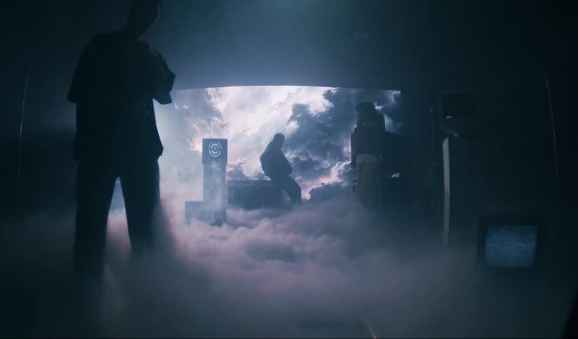 Lights and smoke fill the studio