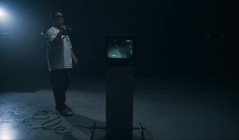 Video filmed by man shows on television set on pedestal