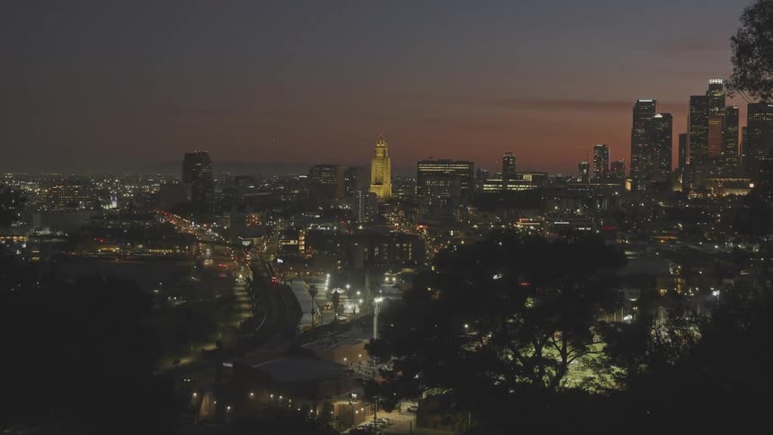 The sun is setting on the city