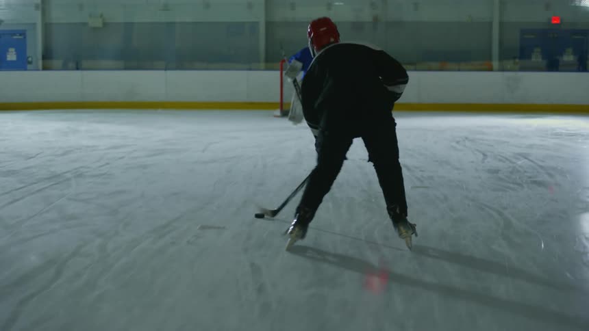 A player scores on the rink