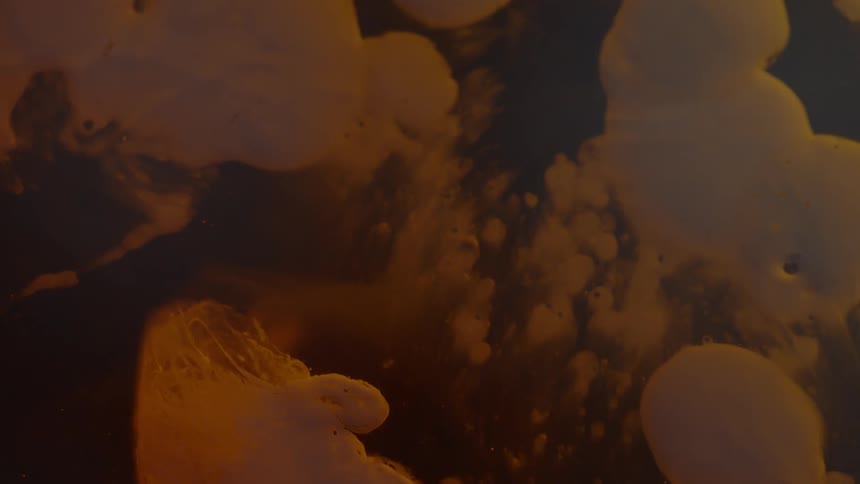 Liquid elements slowly flowing in an abstract context