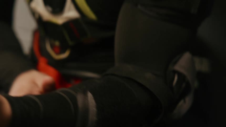 Person wearing a protective elbow pad