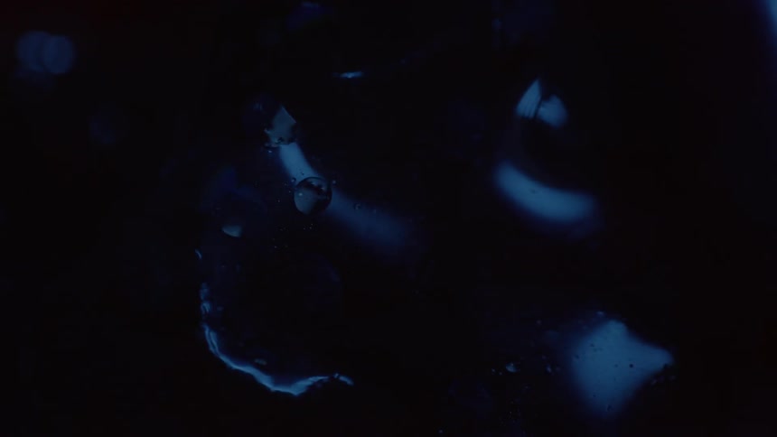The black substance is reflecting some light