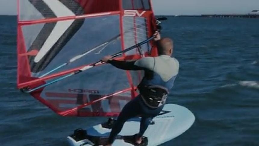 A man sets a speed record for hydrofoil windsurfing