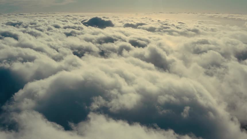 Aerial landscape of clouds with sunlight reflection