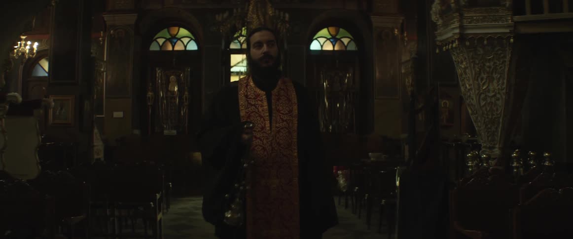 Priest in a church performing a ceremony