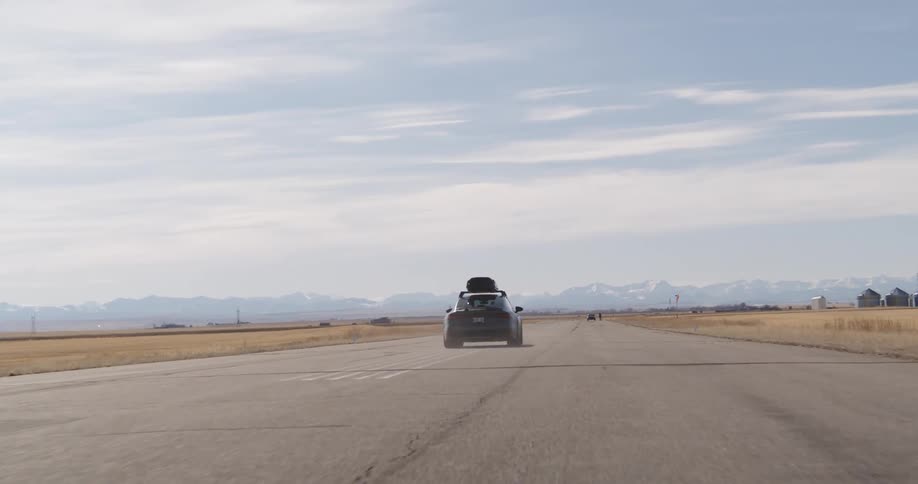 Audi rs7 driving down a highway
