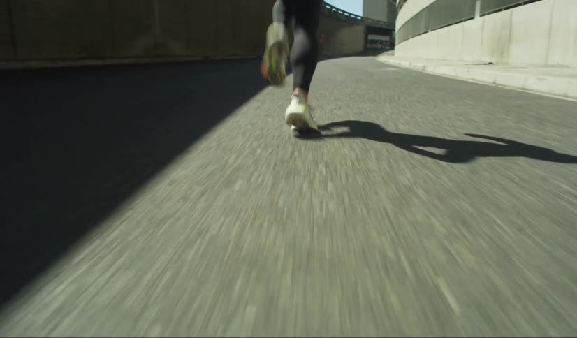 A person is running down the path
