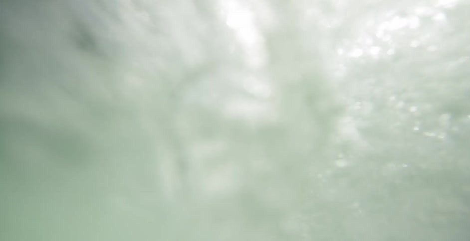 Surfer riding the waves