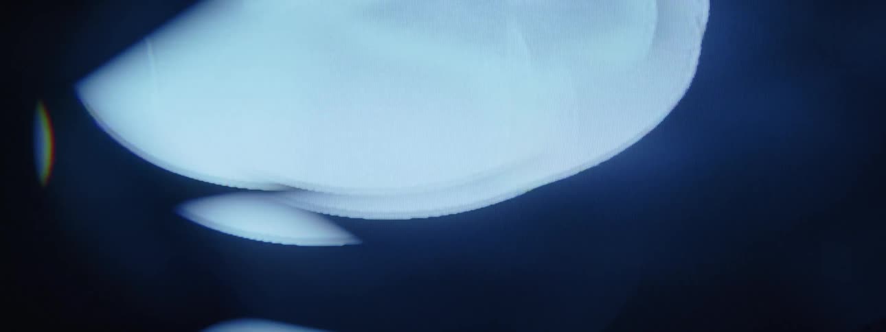 Texture of an abstract holographic projection against a black background