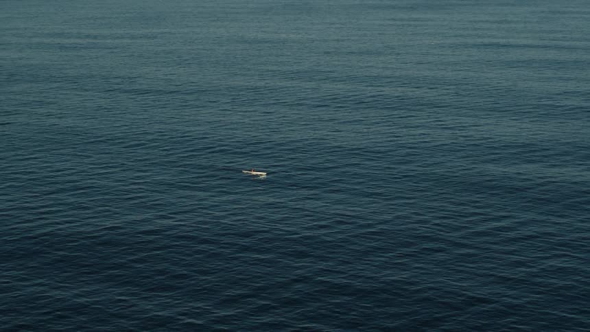 Aerial view of a kayaker navigating the water