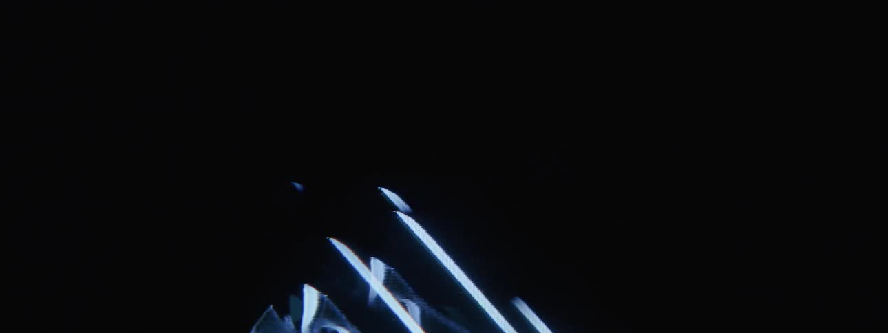Abstract triangular projections against a black background