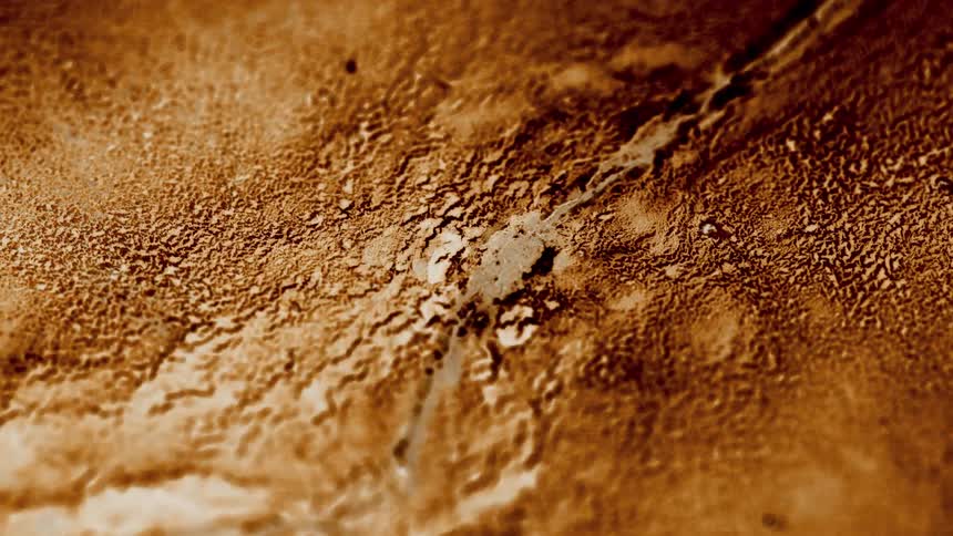 A golden soil type substance splitting apart