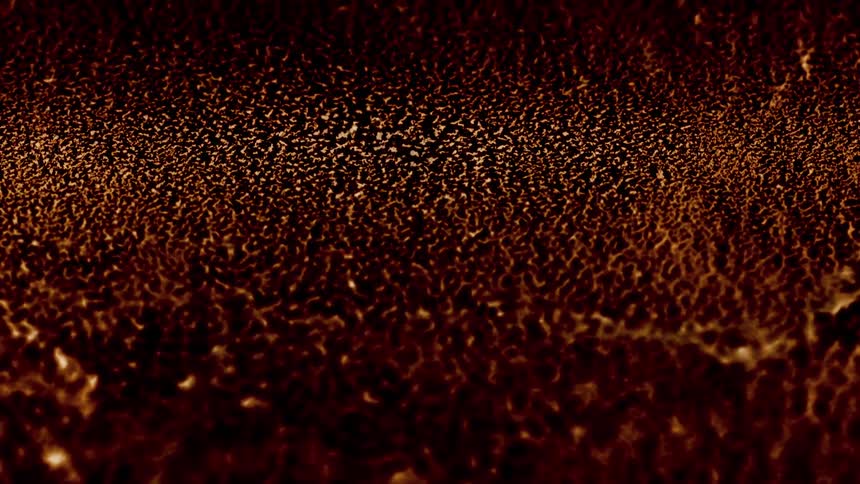 A surface with a brown cracked texture