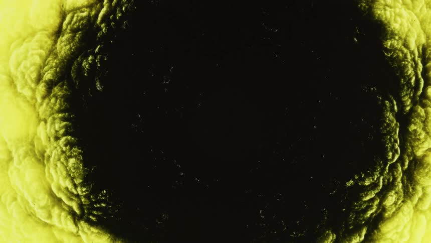 A black hole with a smoky yellow rim moving
