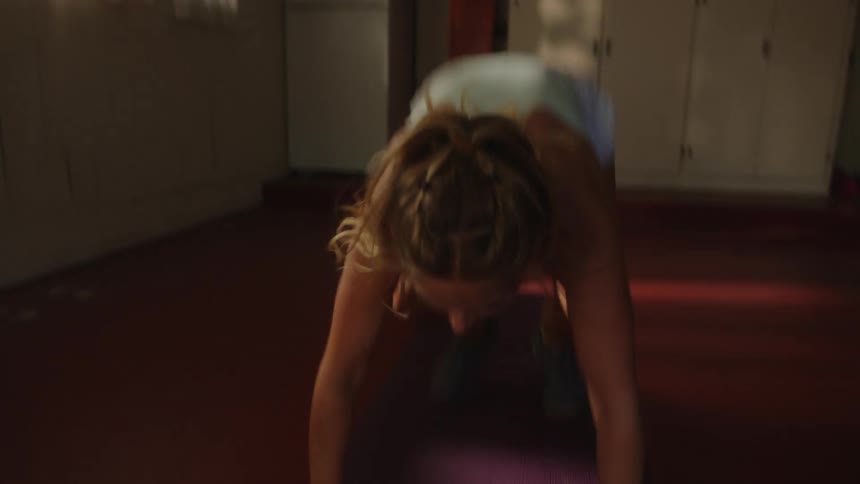 Woman doing burpees