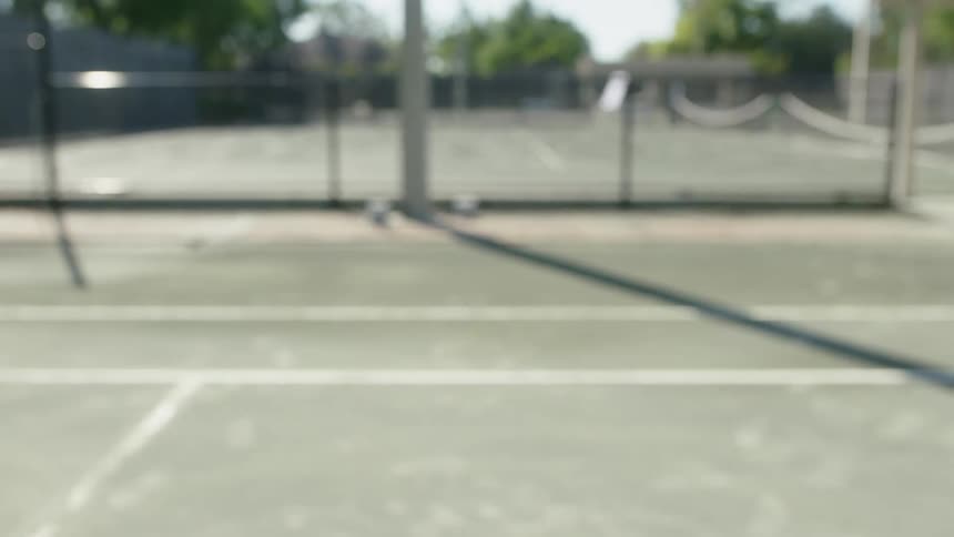 Slow motion of a tennis racket hitting a tennis ball